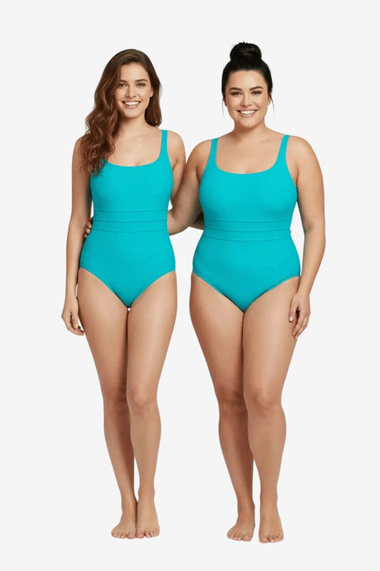 Due donne indossano un costume intero olimpionico Roidal di colore verde acqua.