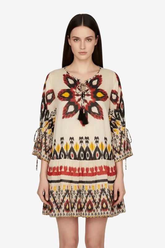Kaftano corto in cotone leggero con stampa etnica multicolore e scollo con laccetti.