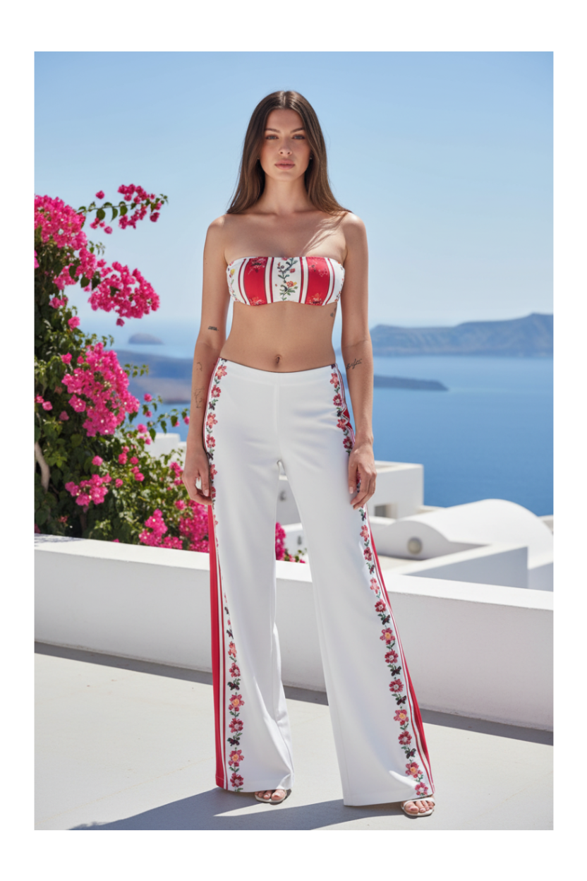 Pantalone palazzo Raffaela D'Angelo in lycra bianco a righe floreali, collezione Cruise.
