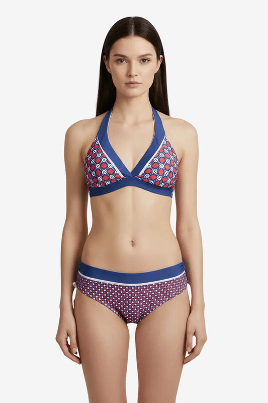Bikini triangolare con stampa geometrica rossa e blu e bordi a contrasto.