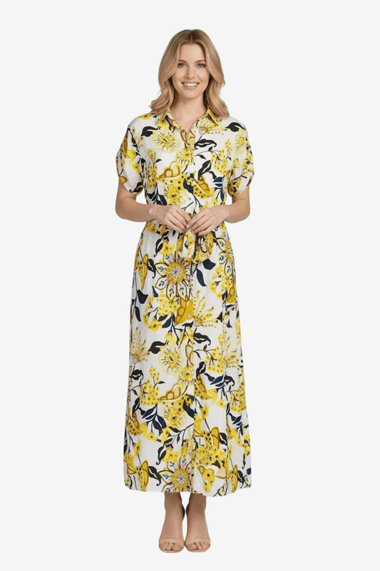 Abito lungo chemisier avorio e giallo con stampa floreale, bottoni frontali e cintura in vita.