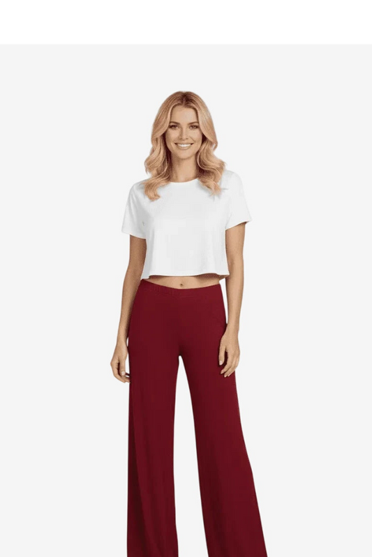 Pantalone lungo da donna color bordeaux con elastico in vita e vestibilità comoda.