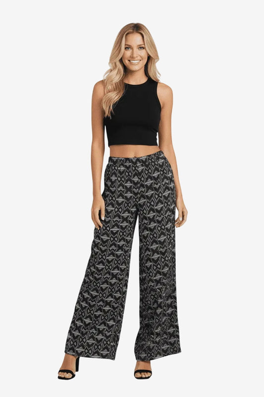 Pantalone donna a gamba larga in viscosa nera con fantasia geometrica ed elastico in vita.